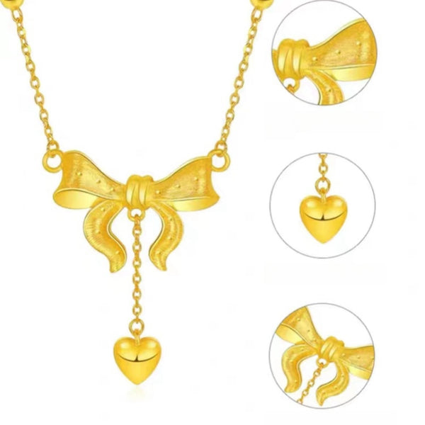 ORIGINAL GOLD  ESCAPIMG PRINCESS BOW NECKLACE